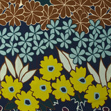 Crêpe polyester imprimé frises de fleurs fond marine
