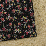 Dentelle imprimée fleurs rouge et jaune fond noir