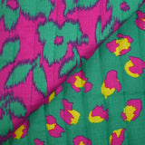 Double gaze matelassée double face Maui fond turquoise et magenta au mètre