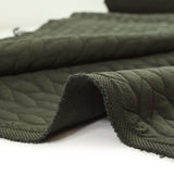 Matelassé Matelassé trenzas de fondo verde militar