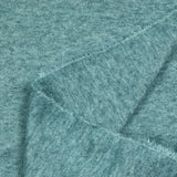 Maille Iris fond turquoise