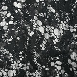Mousseline imprimée bande satin effervescence fond noir