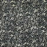 Mousseline imprimée bande satin fleurs fond noir