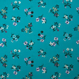 Popeline de coton imprimée bouquet champêtre fond turquoise