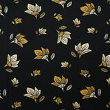 Popeline de coton imprimée fleur jaune pastel et miel fond noir