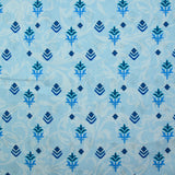 Popeline de coton imprimée fleur symbole fond arabesque bleu clair