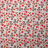 Popeline de coton imprimée fleurette dans le vent rouge fond blanc