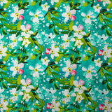 Popeline de coton imprimée jasmin fond turquoise