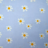 Popeline de coton imprimée marguerite fond ciel
