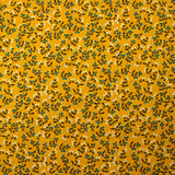 Popeline de coton imprimée pousse fleurie bleu fond jaune soleil