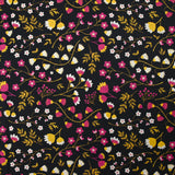 Popeline de coton imprimée tiges de fleurs jaune et fuchsia fond noir