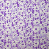 Popeline de coton imprimée vibration de marguerite fond violet