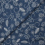 Twill de polyester brodé Solène fond marine