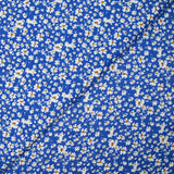 Viscose imprimée fleurs blanches et jaunes fond bleu