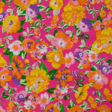 Viscose imprimée fleurs orange fond fuchsia