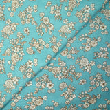 Viscose imprimée printanière blanc cassé fond bleu azurin