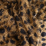 Maille à poil long pois noir fond marron