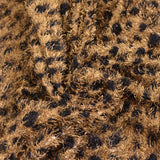 Maille à poil long pois noir fond marron