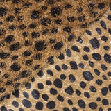 Maille à poil long pois noir fond marron