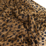 Maille à poil long pois noir fond marron