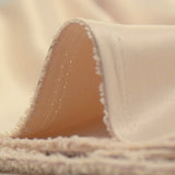 Crêpe satin polyester doré